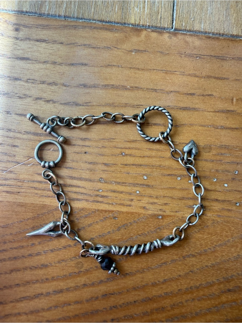 Waxing Poetic Antique Silver Charm Bracelet with Black Accents